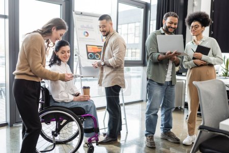 diversity and inclusion, interracial startup team planning project with  disabled businesswoman