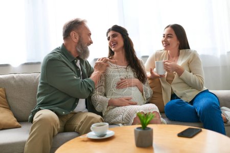 father paid visit to his pregnant daughter and her partner, in vitro fertilization concept