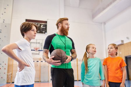 A man holding a basketball in front of a group of diverse, enthusiastic kids in a bright classroom setting, teaching and inspiring them.