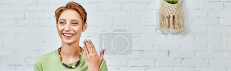 joyful woman pointing at her face with perfect skin, vegetarianism concept, horizontal banner