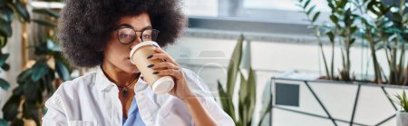 attractive woman in glasses drinking her coffee while working on project, business concept, banner
