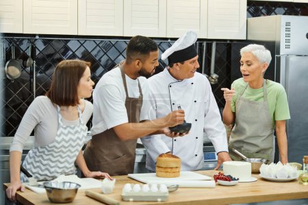 young diverse friends and chef looking at mature woman in apron asking question, cooking courses