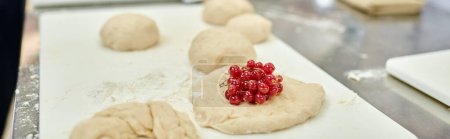 object photo of undercooked biscuits with fresh delicious red currant on it, confectionery, banner