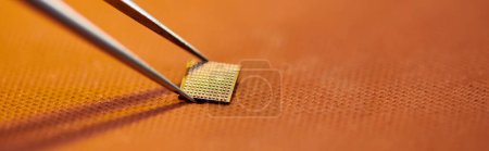 Photo for Close up view of electronic microscheme and tweezers on table in repair shop, horizontal banner - Royalty Free Image