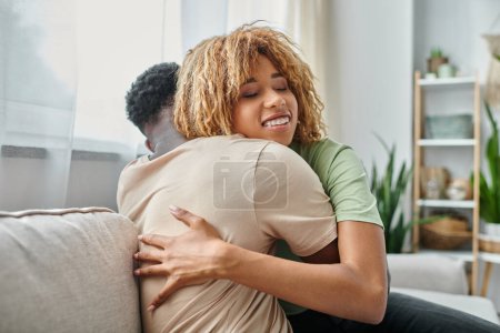 Tender moment between african american couple at home, bonding and closeness between man and woman