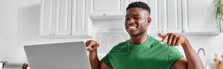 happy deaf african american freelancer using sign language during online meeting on laptop, banner