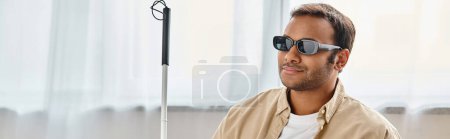 Photo for Joyous indian man with blindness in everyday cozy attire with glasses and walking stick, banner - Royalty Free Image
