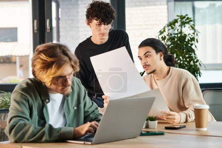 Photo for Team of young entrepreneurs in their 20s engaged in project planning in bright office, startup idea - Royalty Free Image