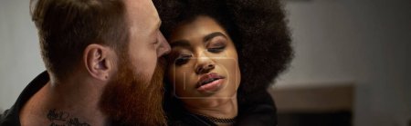 banner of man with beard seducing curly african american woman in dress during date, sexy couple