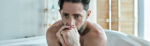 sick man sitting in bathtub with hands near face during breakdown, mental health awareness, banner magic mug #694539742