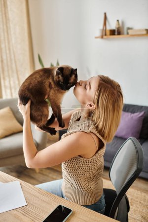 A woman with short hair gently lifts her cat to her face, their bond evident in their eyes.