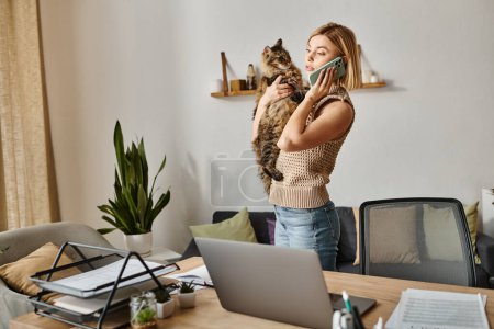 A woman with short hair cuddles her cat in front of a laptop, enjoying a cozy moment at home.
