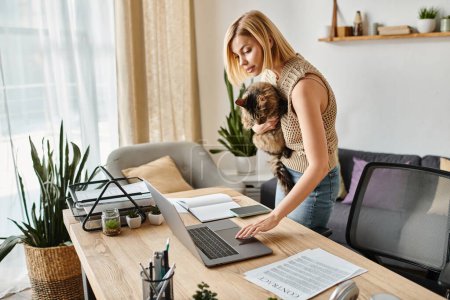 A stylish woman stands at a desk, working on a laptop, as her loyal cat keeps her company with a playful presence.