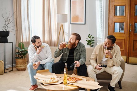 Three cheerful, interracial men in casual attire enjoying pizza and beer on a couch, expressing friendship and camaraderie.