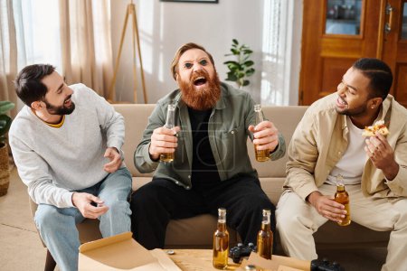 Three handsome, cheerful men of different races sit on a couch, enjoying beers and camaraderie in a relaxed setting.