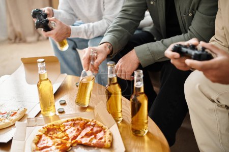 Three handsome friends of different races enjoying pizza and beer around a table in a cozy setting, exuding joy and camaraderie.