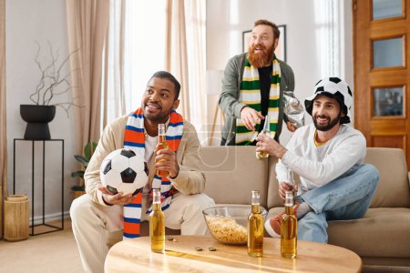 Three handsome, cheerful men in casual attire sharing laughs and companionship in a warm, inviting living room setting.