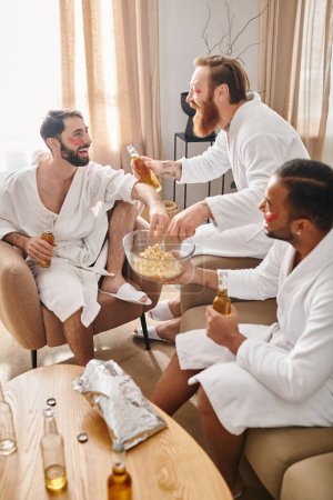 Diverse men in bathrobes relaxing in a living room, engaging in lively conversations and enjoying each others company.