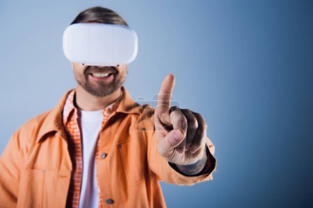 A man in a VR headset stands with a blindfold pointing directly at the camera, embodying a unique perspective.