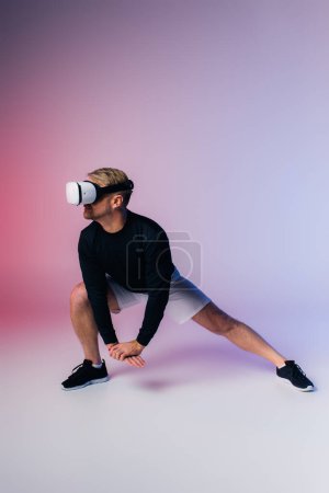 A stylish man in a black shirt and white shorts poses in a studio setting, virtual reality