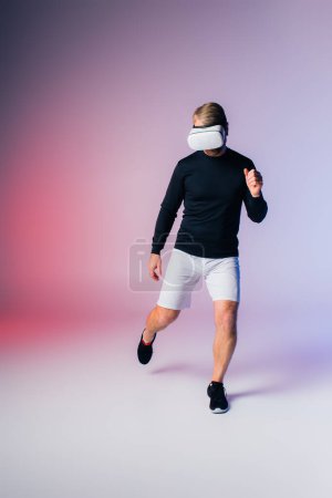 Photo for A man in a black shirt and white shorts dashes through an unknown world with determination and speed. - Royalty Free Image