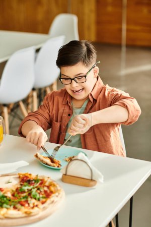 preadolescent joyous inclusive boy with Down syndrome with glasses eating pizza while in cafe