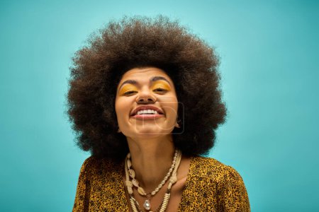 A stylish African American woman in trendy attire, with a beaming smile and a luscious afro.