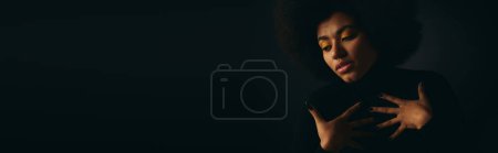 Photo for Stylish African American woman posing actively. - Royalty Free Image