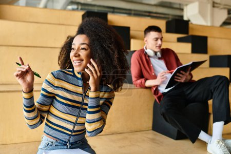 Photo for A woman, sitting on the floor, engaged in a phone call - Royalty Free Image