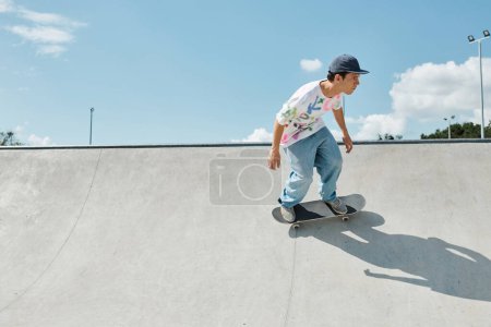 A young man confidently rides a skateboard up a steep ramp at an outdoor skate park on a sunny summer day.