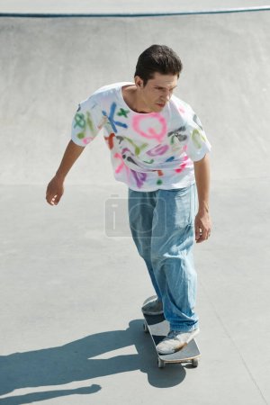 A young man skillfully rides a skateboard on a ramp at an outdoor skate park on a sunny summer day.