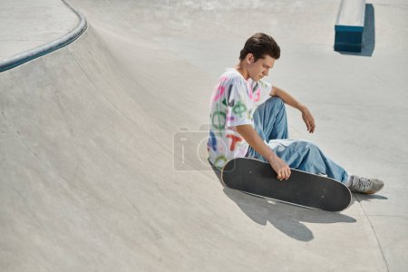 A young man deep in concentration as he sits on his skateboard gliding through a vibrant skate park on a sunny summer day.