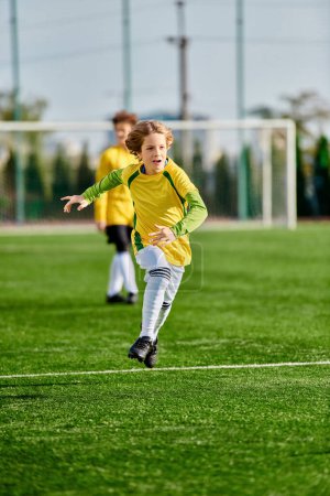 A young girl in a yellow and green soccer uniform is kicking a soccer ball with determination and skill.
