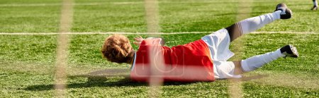 Photo for A person in casual clothing lying on the ground, looking relaxed, next to a soccer ball. The sun is shining brightly, casting shadows on the ground. The person seems to be taking a moment to rest and enjoy the peaceful atmosphere. - Royalty Free Image