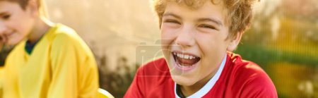 Photo for Two young boys, filled with overwhelming joy, sharing a moment of pure happiness as they burst into laughter together. - Royalty Free Image