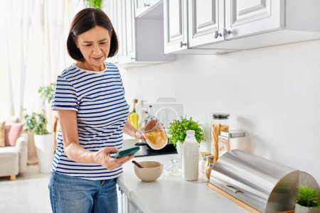 A woman in cozy homewear prepares food in a kitchen.