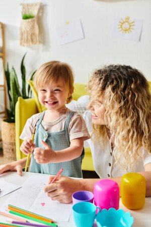 A curly mother and her toddler daughter engage in Montessori learning at a home table, focusing on education.
