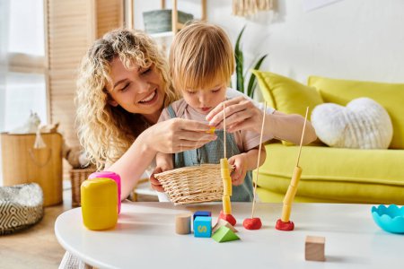A woman and child happily engaging in the Montessori method of education at home.
