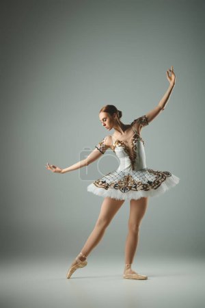 Junge Ballerina in Tutu und Trikot tanzt anmutig en pointe.