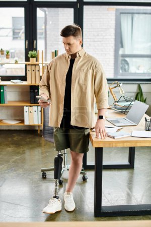 A handsome businessman with a prosthetic leg stands at a desk in a bustling office.