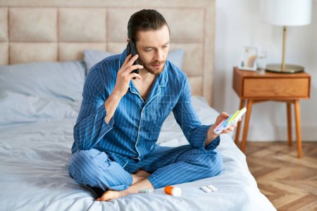 A man sitting on a bed, engaged in a phone call.