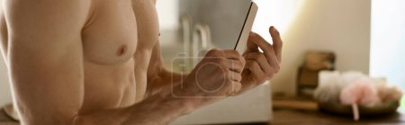 Photo for A man holding nail file at home. - Royalty Free Image