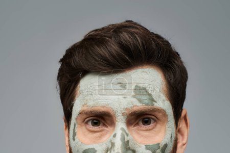 Photo for A man with a face mask looking at camera. - Royalty Free Image