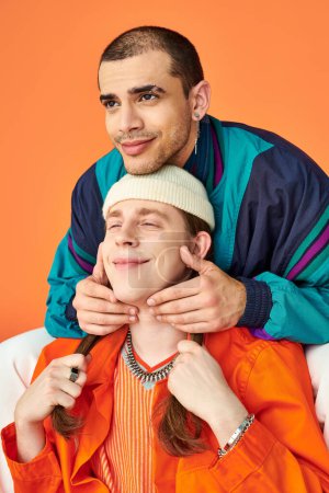 A man balancing on top of another mans head in a creative and artistic pose.