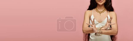 Photo for A young indian woman with long hair poses gracefully for a portrait. - Royalty Free Image