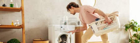 Man holding laundry basket in front of a running dryer.