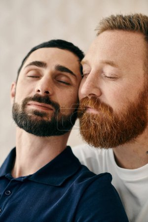 Foto de Two men with beards hugging each other in a warm embrace, expressing deep connection and love in a modern living room. - Imagen libre de derechos