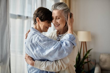 Two elderly women share a warm embrace in their cozy living room.
