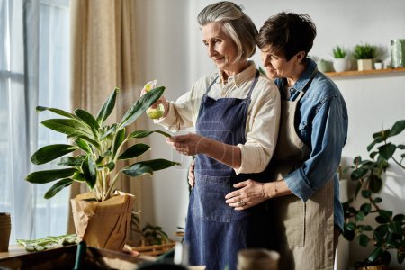 Two elderly women peacefully observing a potted plant.
