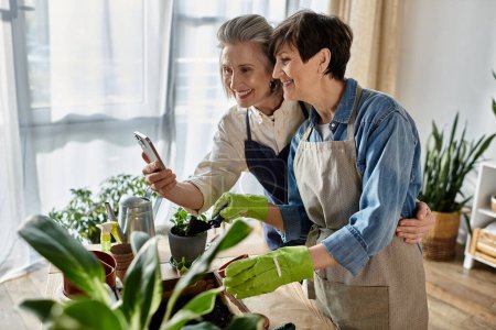 Two elderly women happily photograph their beloved plants in their garden.